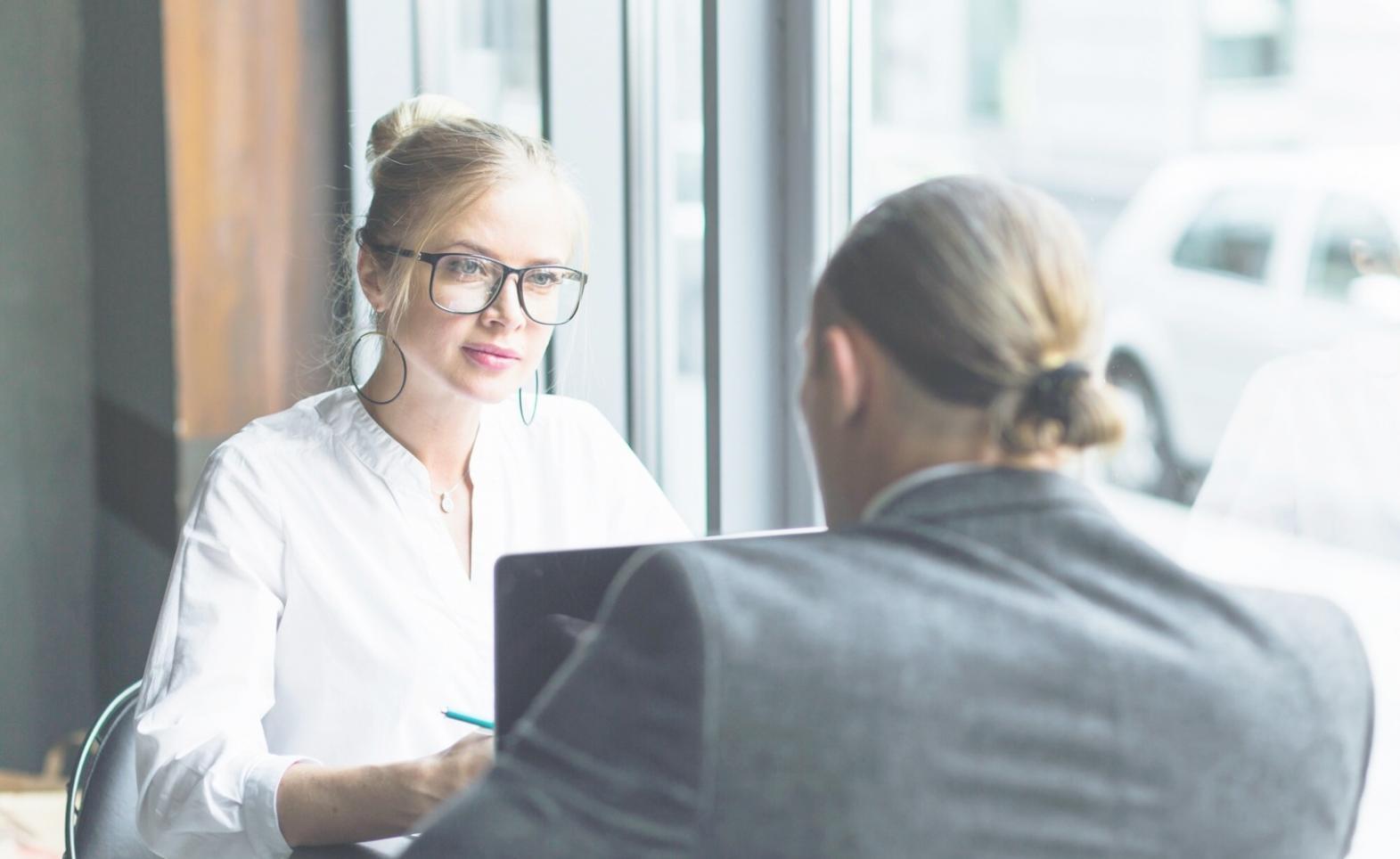 Study materials workspace with investment guides and planning documents